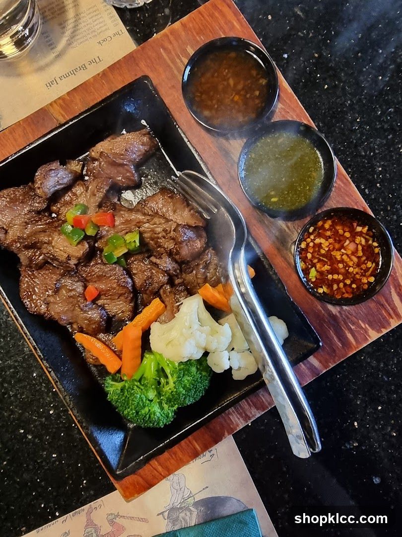Sizzling Steak with Vegetables and Sauces