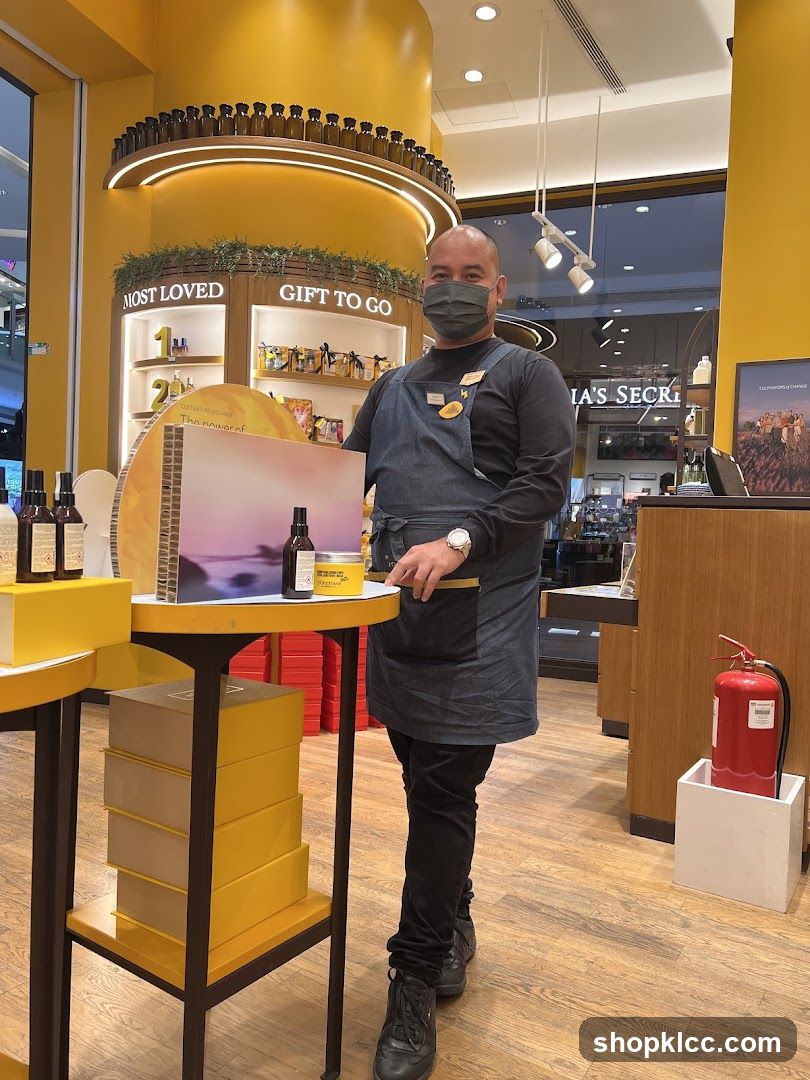 Store employee in a yellow-themed store
