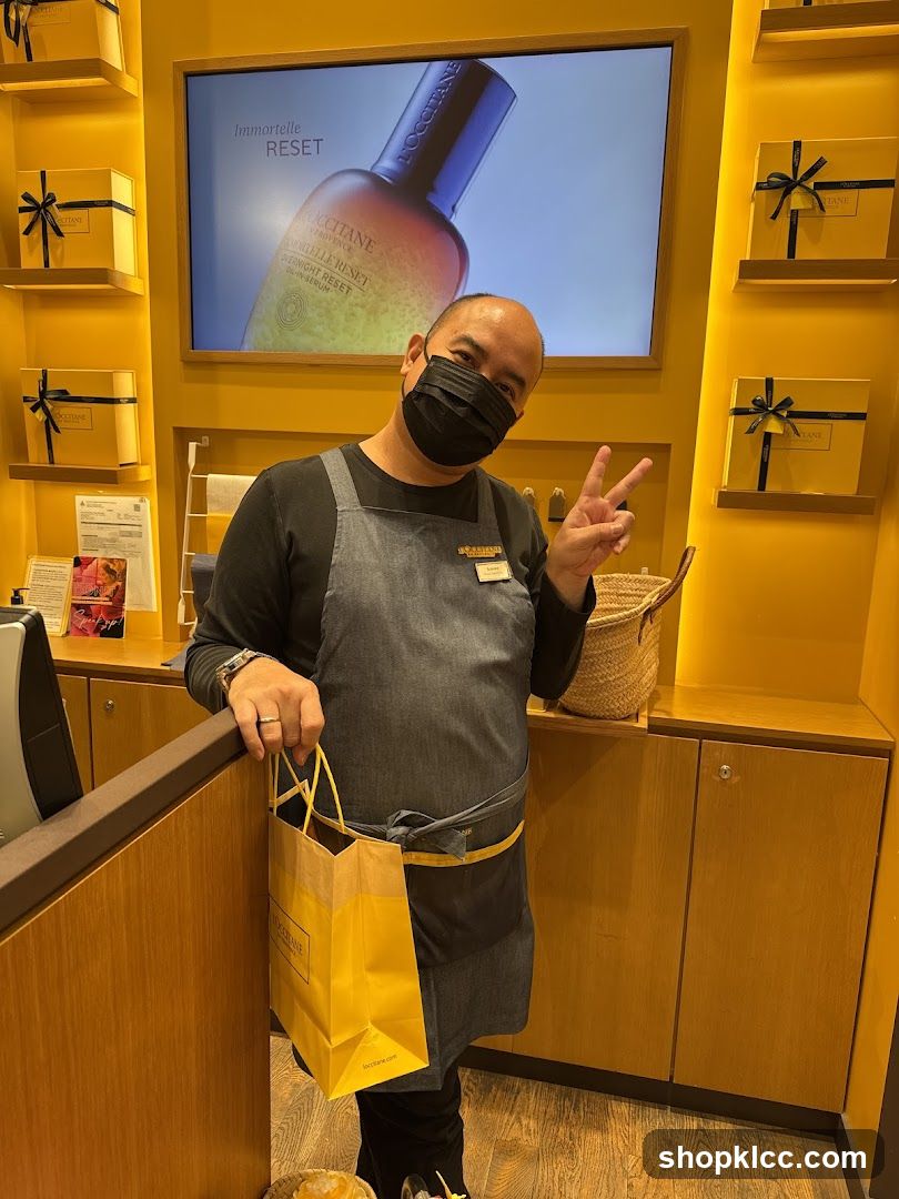 Sales Associate with Shopping Bag