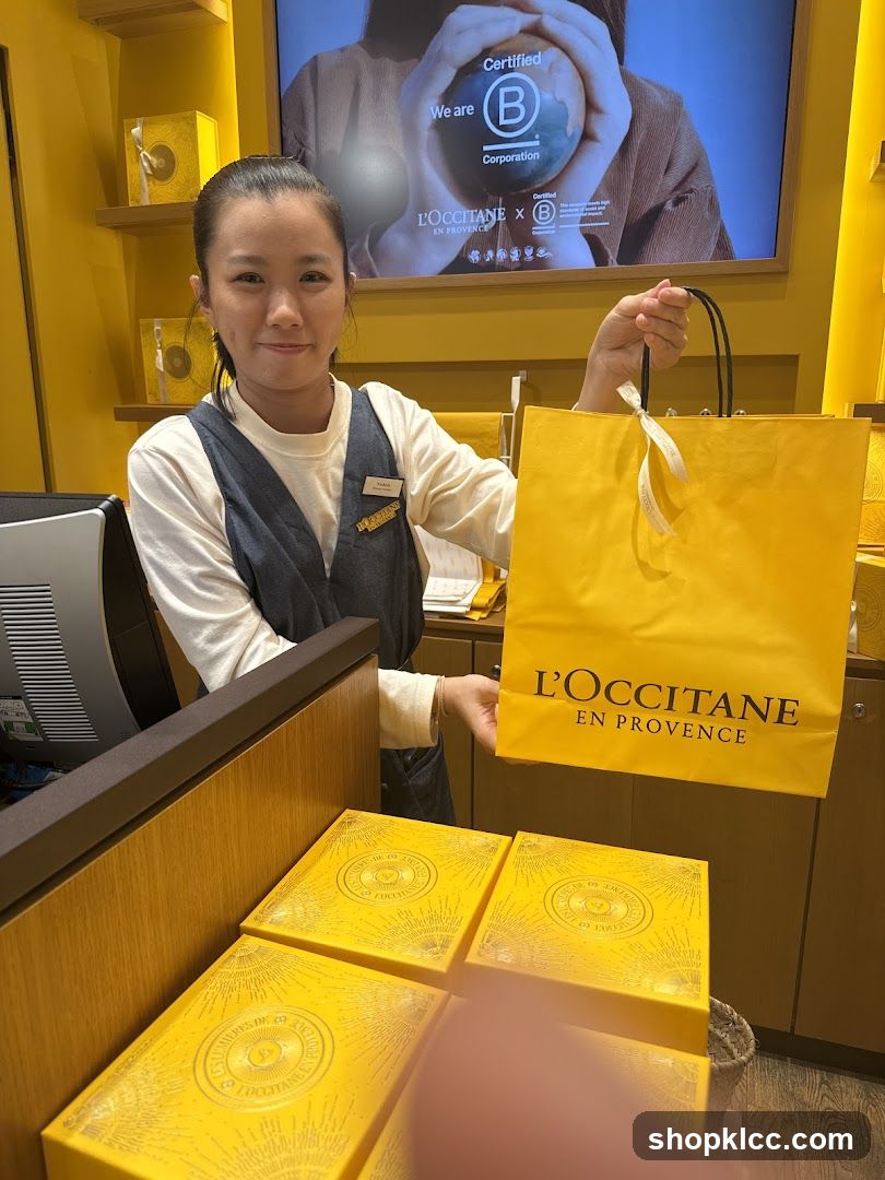 L'Occitane Employee with Shopping Bag