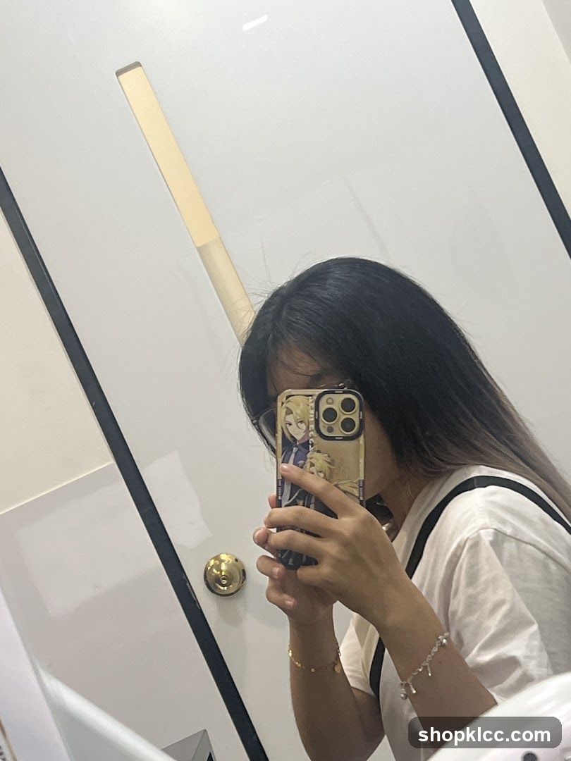 Woman Taking a Mirror Selfie