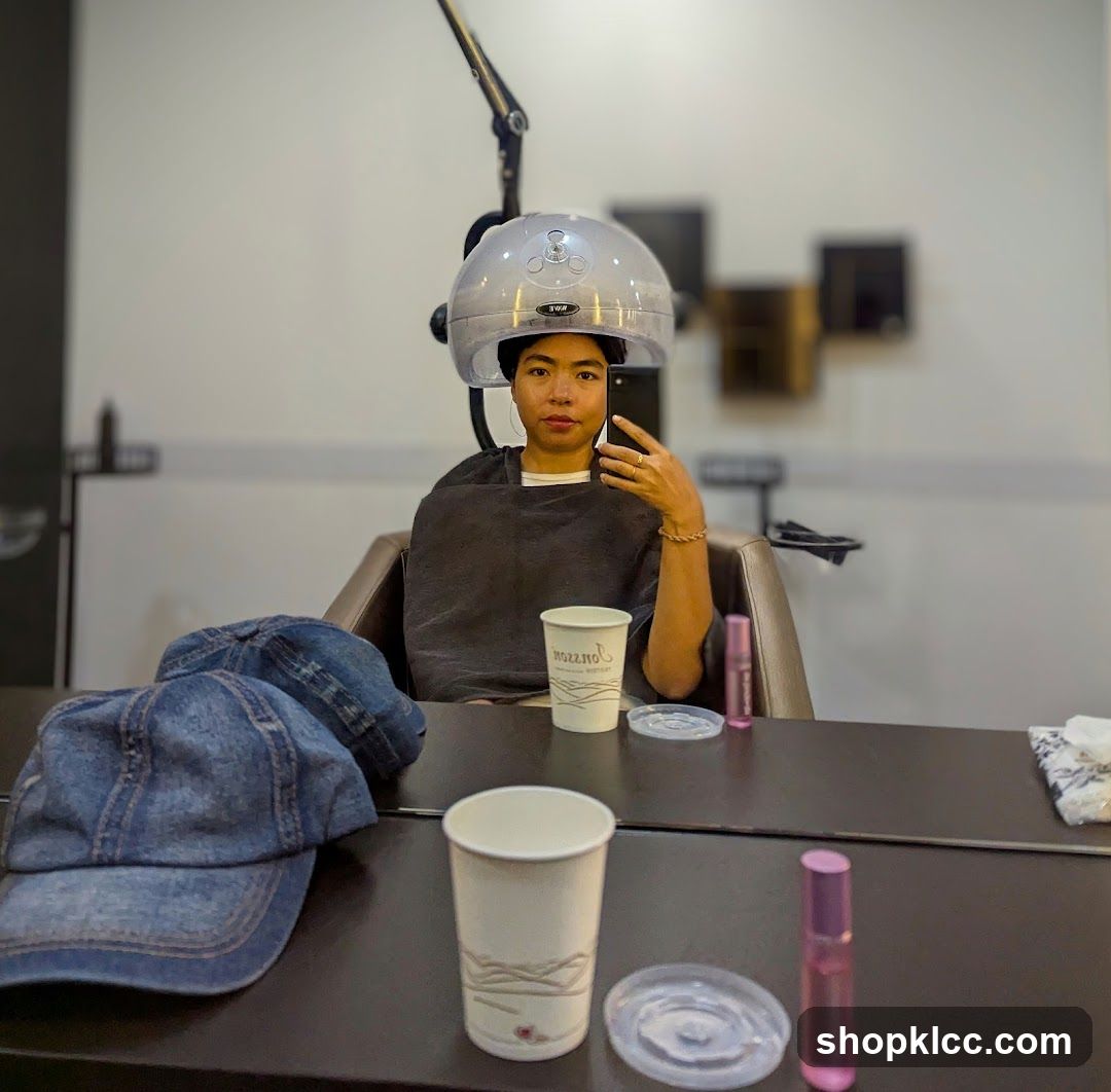 Woman under hair dryer