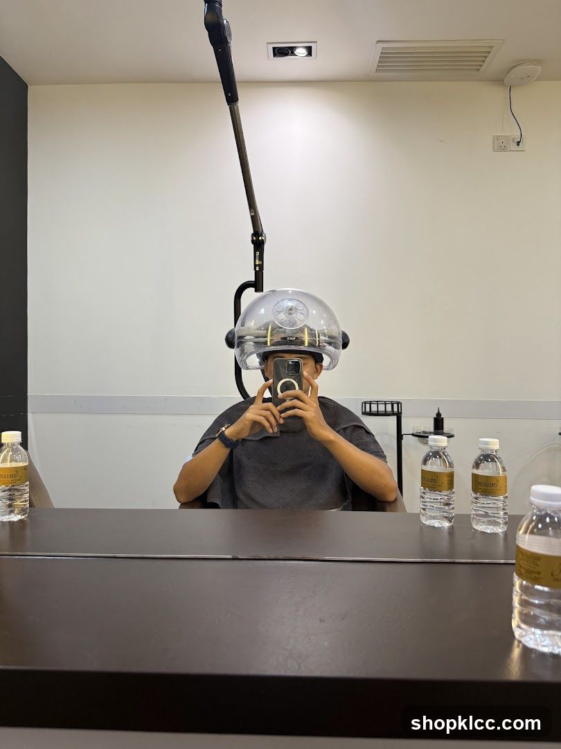 Person under a hair dryer