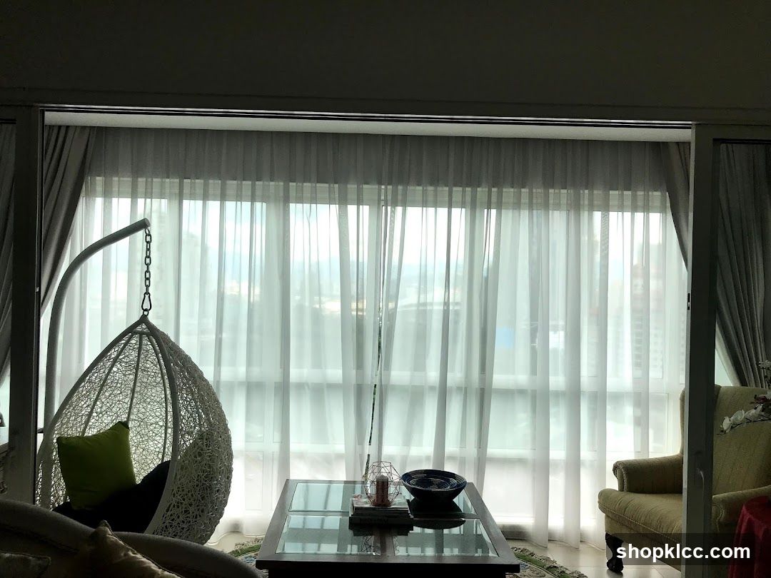 Living Room with Hanging Chair and Large Window