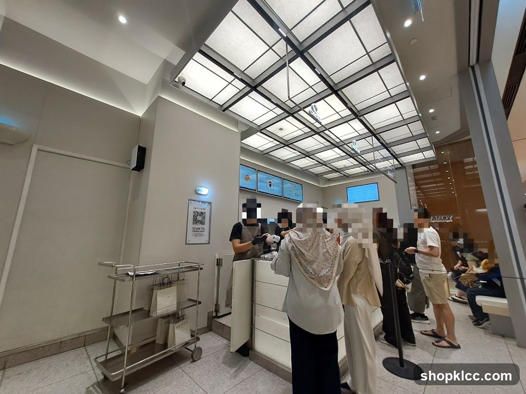 People queuing at a beverage shop