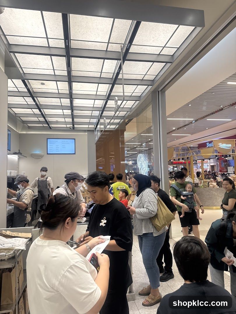 People queuing at a food establishment