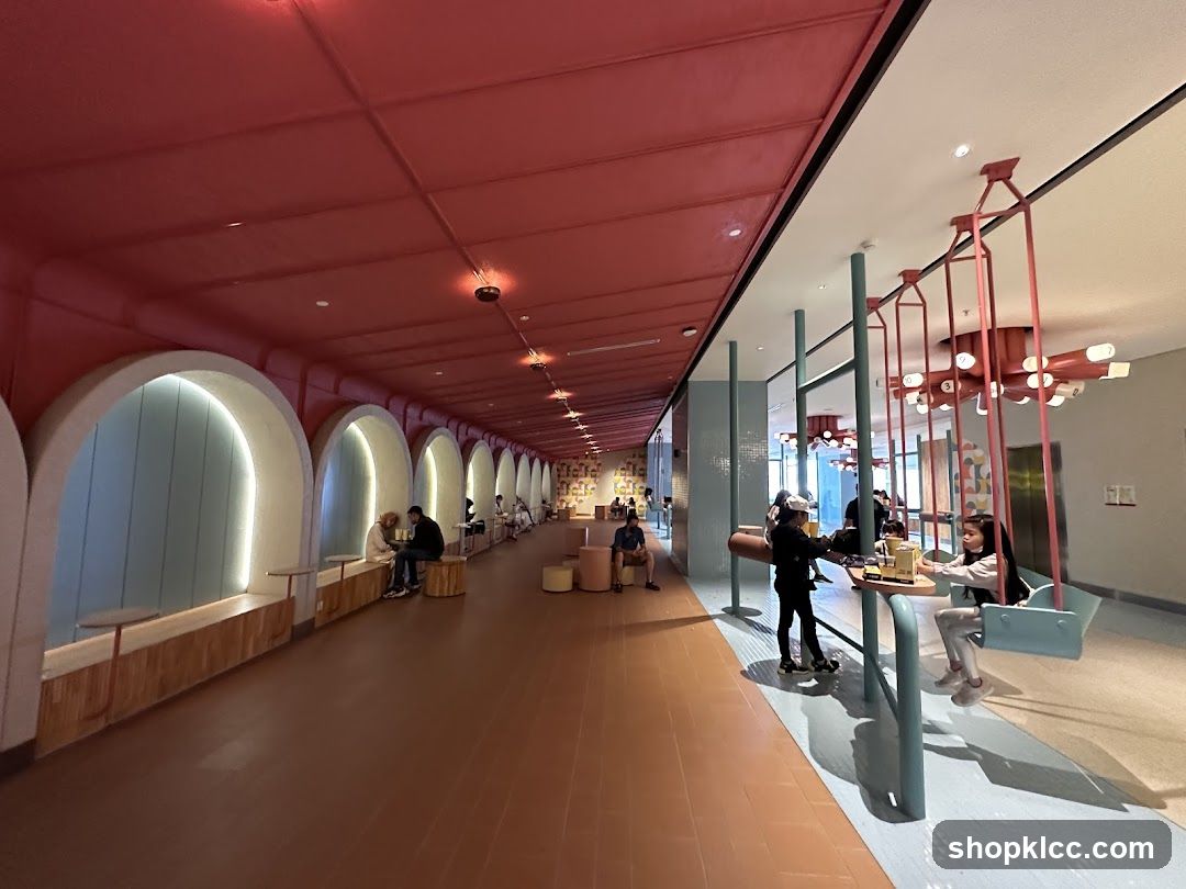 Modern cafe interior with arched seating and swings