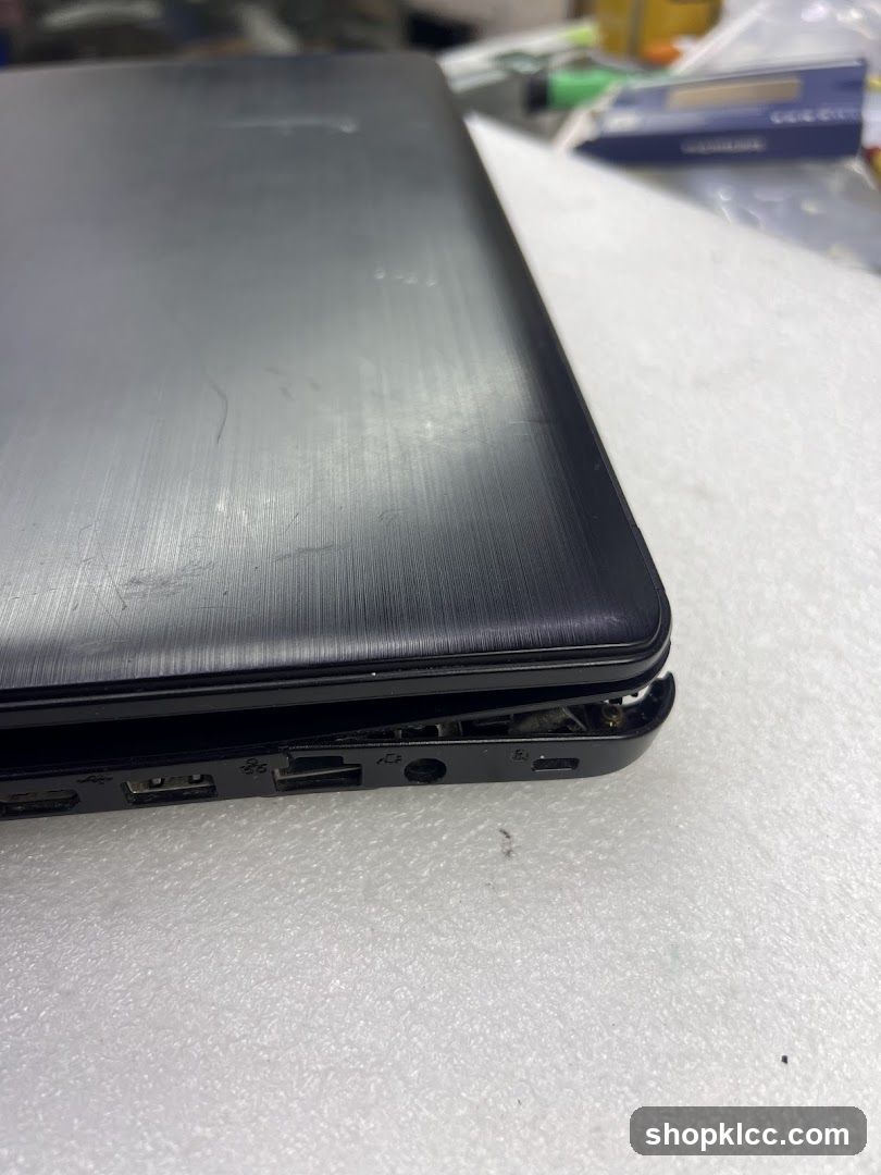 Damaged Laptop Side