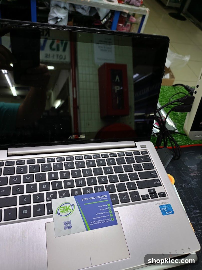 Business card on laptop
