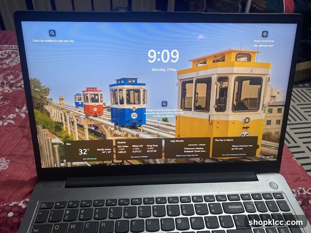 Laptop Lock Screen with Weather and News