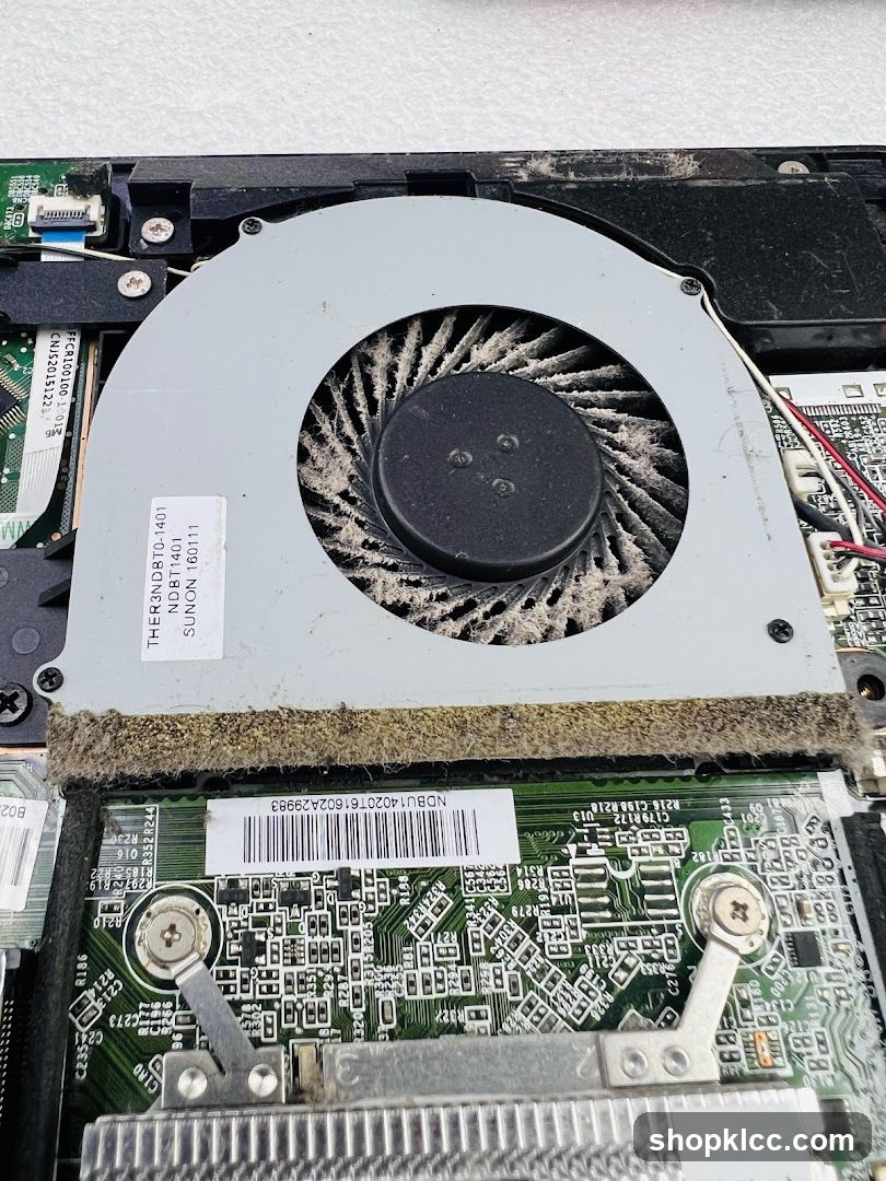 Dusty Laptop Fan and Motherboard
