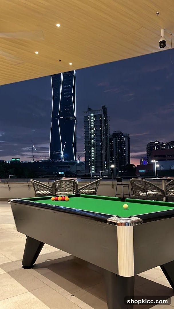 Rooftop Pool Table with City View at Dusk