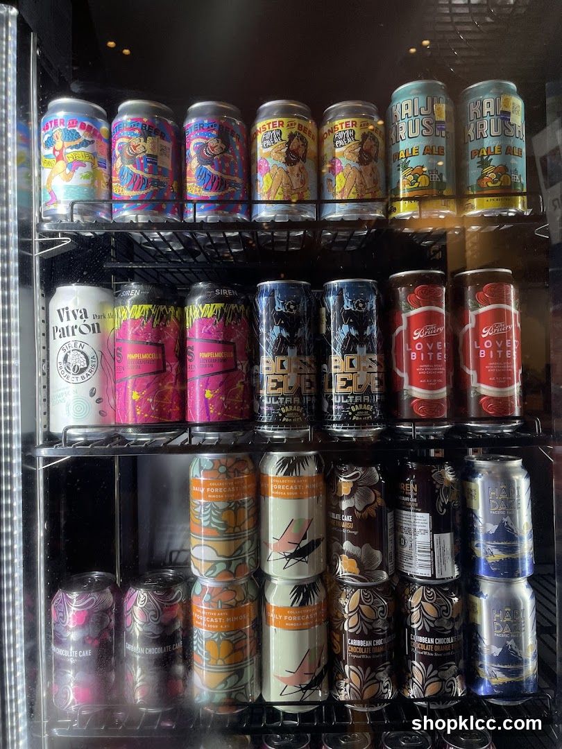Cans of Beer in Refrigerator