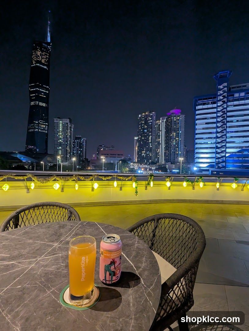 Rooftop drinks with city view at night