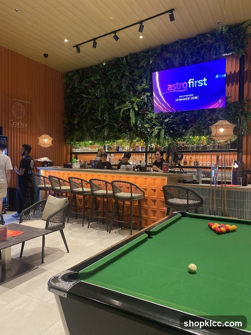 Bar with Pool Table and Green Wall