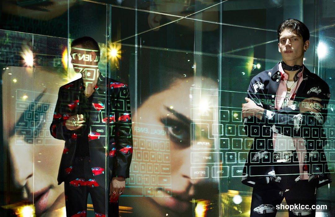 Models in patterned suits with digital overlay
