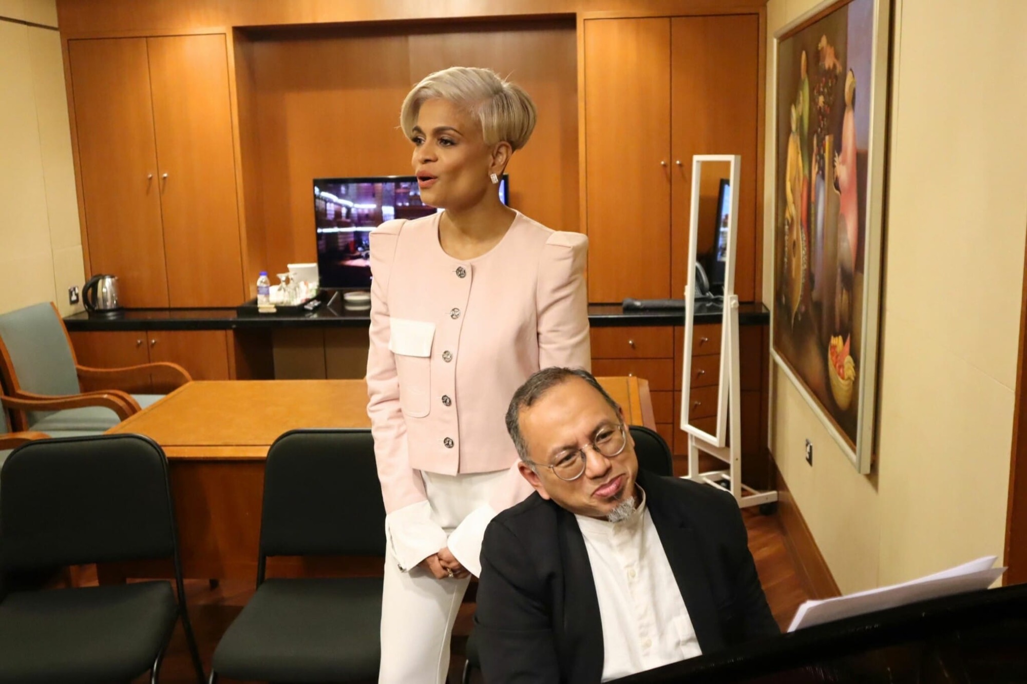 Jaclyn Victor and Ahmad Muriz Che Rose working through a score at Dewan Filharmonik PETRONAS