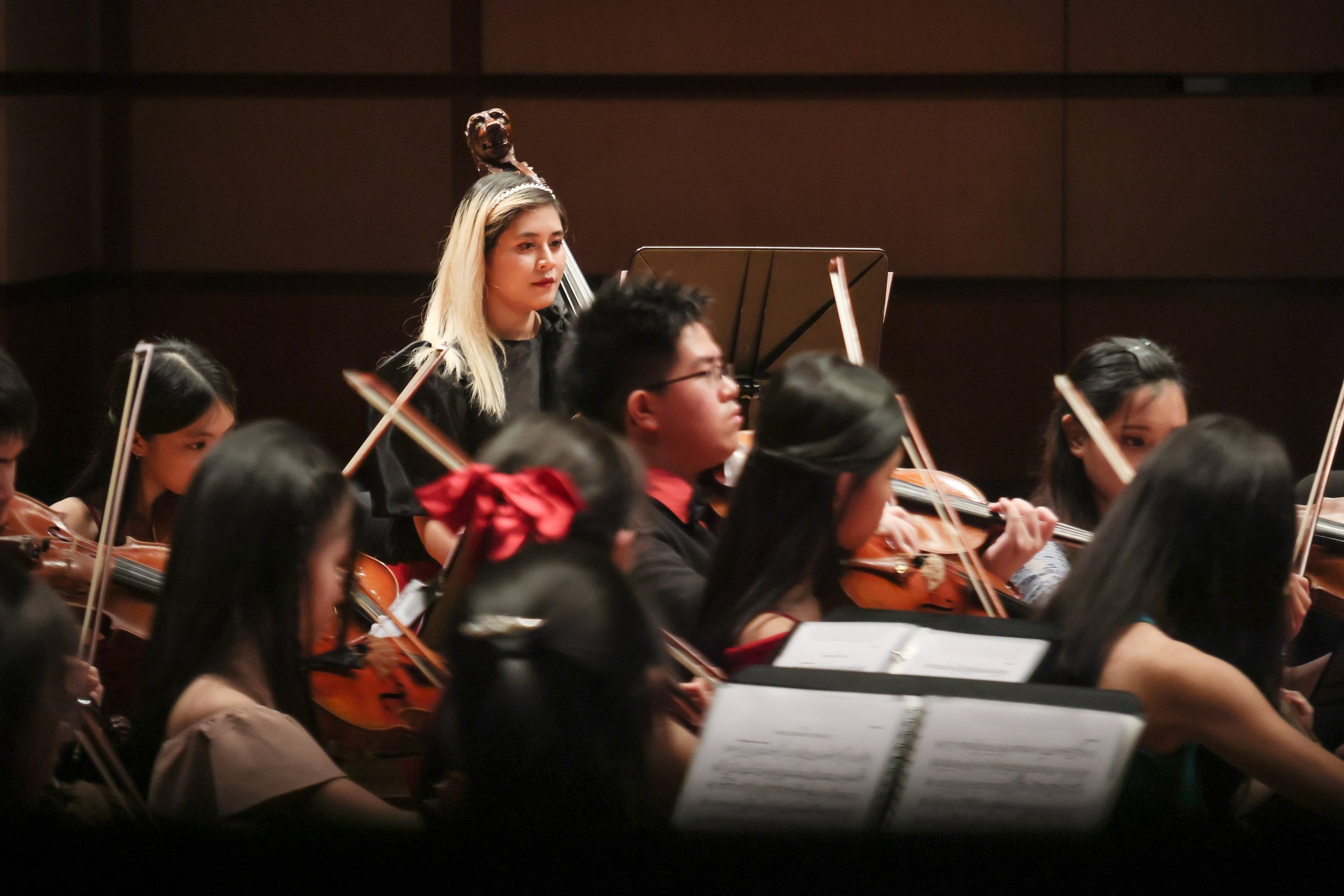 Malaysian Philharmonic Youth Orchestra strings section on the Dewan Filharmonik PETRONAS stage