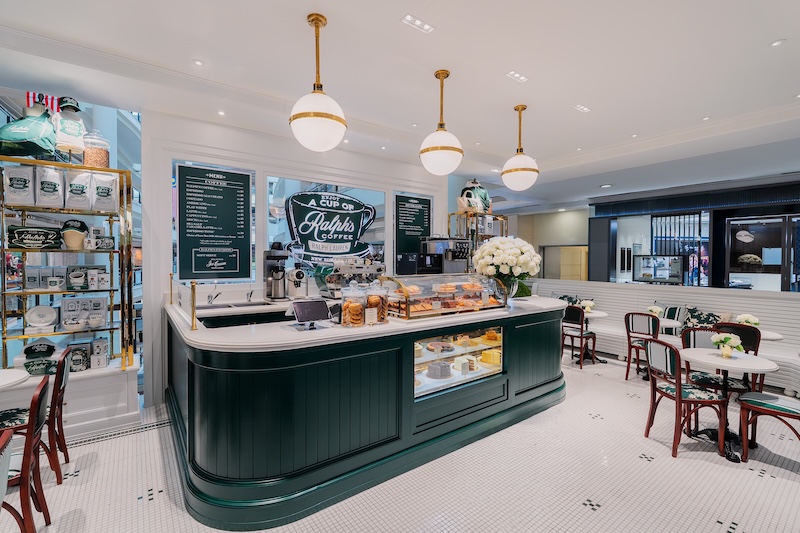 Seating and green-and-wood interior at Ralph's Coffee, Level 1 Suria KLCC