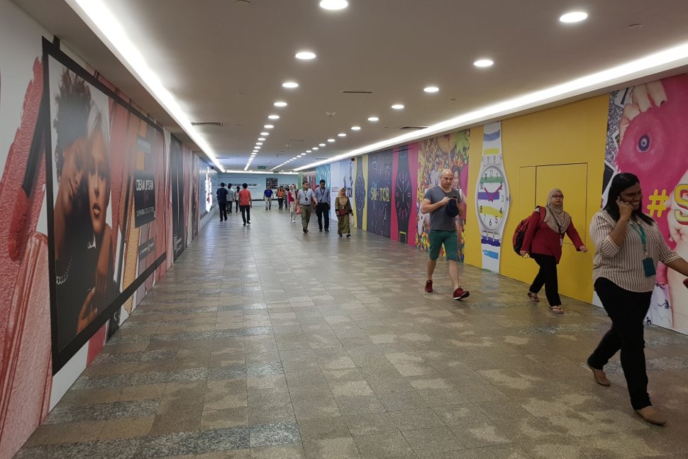 Covered walkway linking KLCC LRT station to Suria KLCC